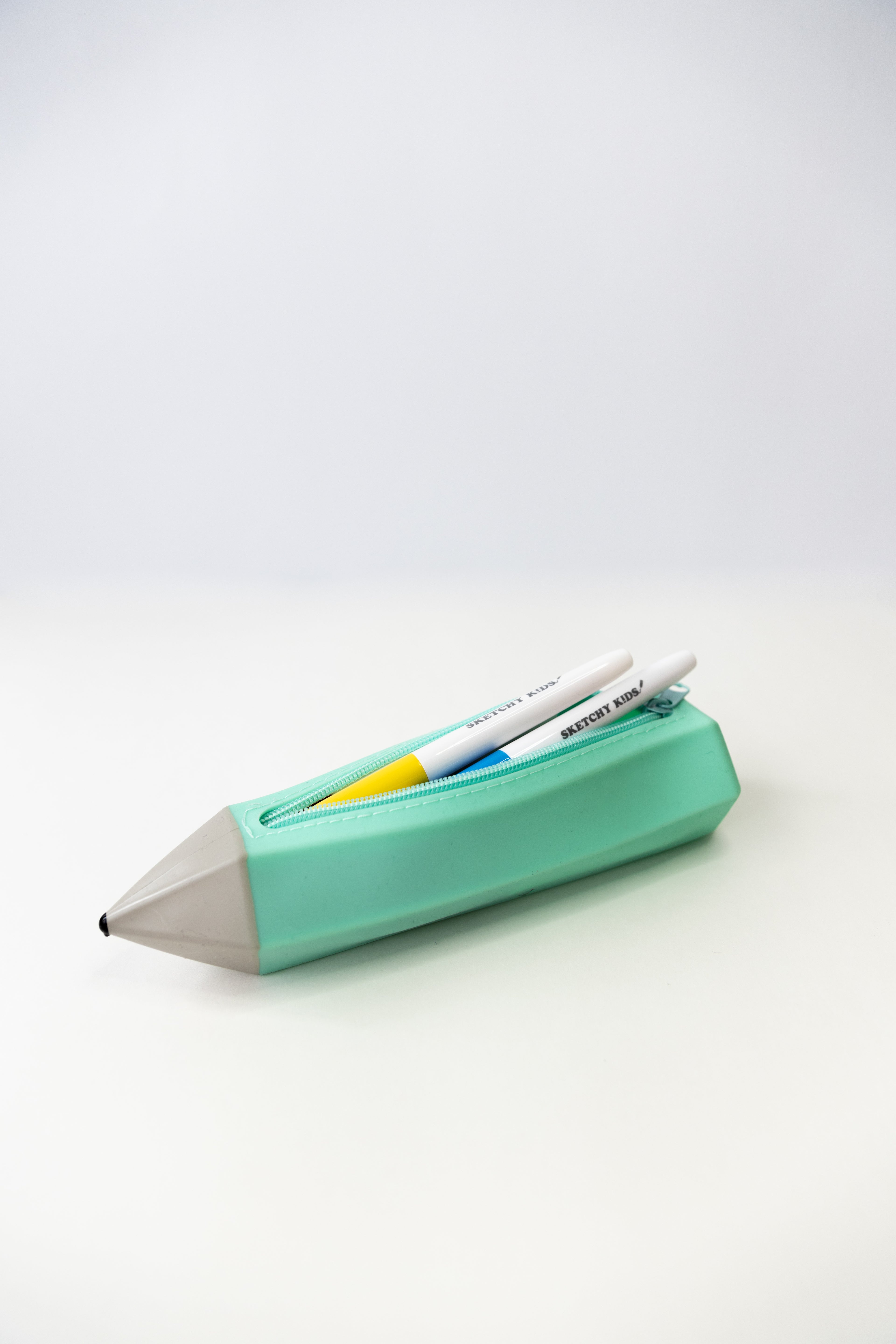 turqoise silicone pencil shaped pencil case